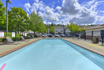 Relaxing pool area with sundeck